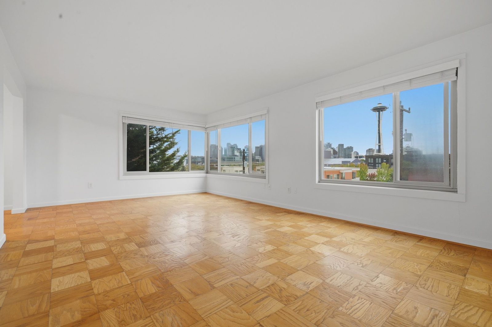 Corner living room with parquet flooring